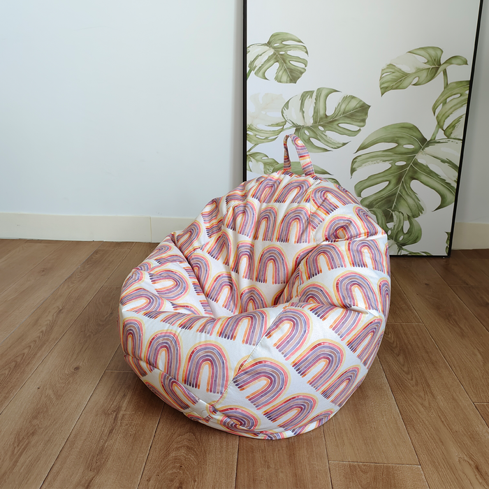 This isteardrop kids bean bag with Holly  pattern  of colourful rainbows