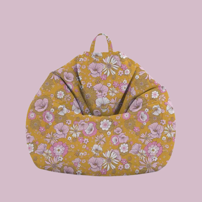 teardrop kids bean bag with retro pink and white floral on a mustard background