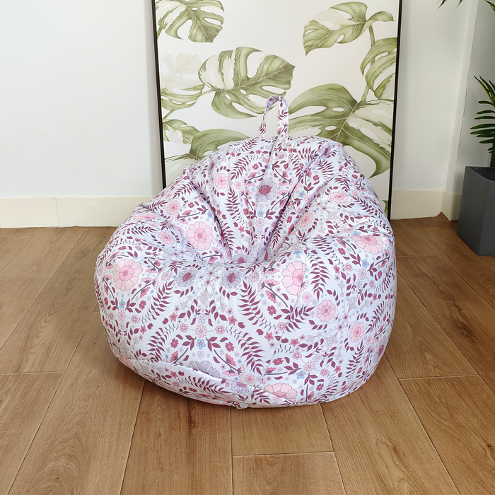 teardrop kids bean bag with floral folky pattern on a soft pastel pinks 